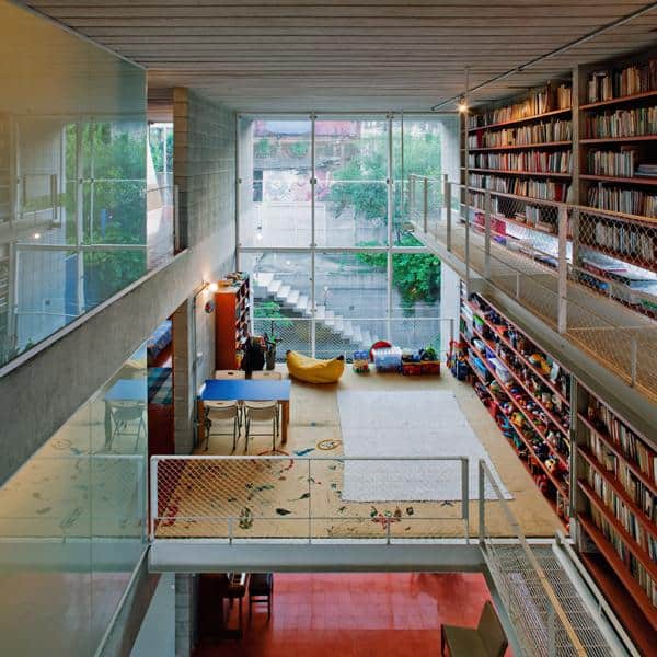 3 storey wall books creates privacy contemporary home 10 street view